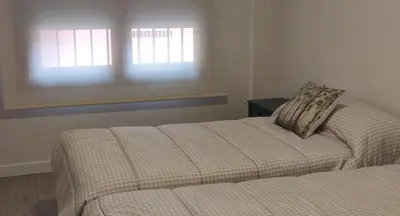 Cama o camas de una habitación en Txoko Loft Bardenas