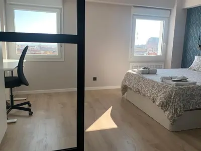 Cama o camas de una habitación en Espectacular loft lleno de luz y espacio!