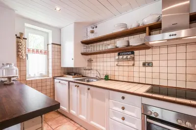 Una cocina o zona de cocina en Cap Dera Vila by Totiaran
