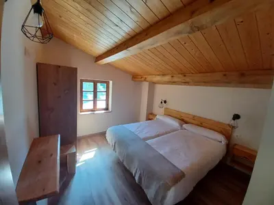 Cama o camas de una habitación en IRATIKO KABIAK