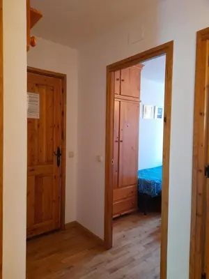 Cama o camas de una habitación en Ambiente de montaña- Chimenea, vistas y jardín- Isard 4