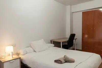 Cama o camas de una habitación en Funcional y renovado apartamento en Iturrama