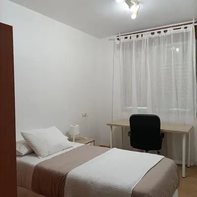 Cama o camas de una habitación en Funcional y renovado apartamento en Iturrama