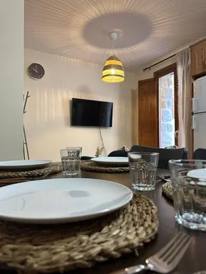 Una televisión o centro de entretenimiento en Apartamento La Fonteta