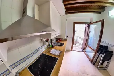 Una cocina o zona de cocina en El Ático de Luz - tucasaenlospirineos