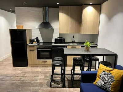 Una cocina o zona de cocina en Apartamenticos El Tubo I