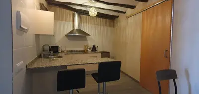 Una cocina o zona de cocina en APARTAMENTS LA DONZELLA