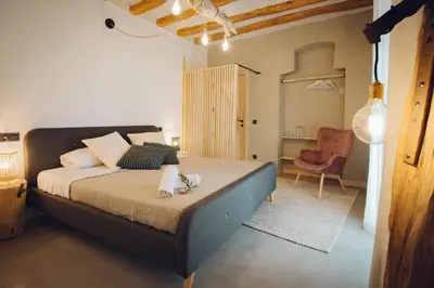 Cama o camas de una habitación en Castell de l'Aguda