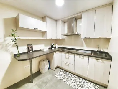 Una cocina o zona de cocina en Apartamentos Dos Torres Meriadoc