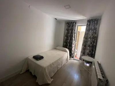 Cama o camas de una habitación en Apartamentos Dos Torres Sindarin