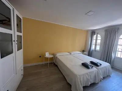 Cama o camas de una habitación en Apartamentos Dos Torres Sindarin