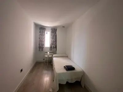 Cama o camas de una habitación en Apartamentos Dos Torres Sindarin