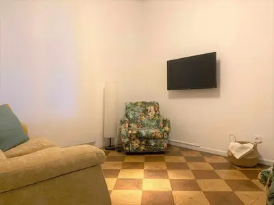 Una televisión o centro de entretenimiento en Apartamento Catedral
