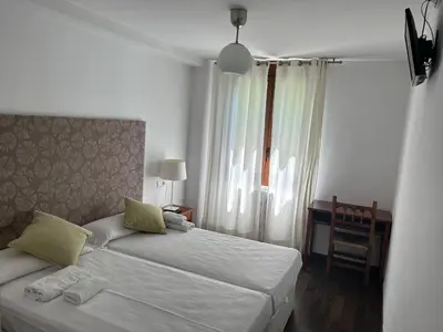 Cama o camas de una habitación en Hotel-Restaurante Badain
