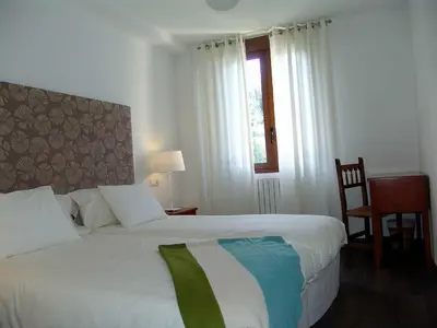 Cama o camas de una habitación en Hotel-Restaurante Badain