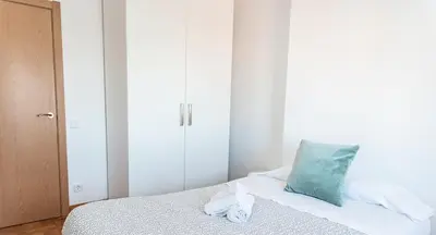 Cama o camas de una habitación en Adaptado y cómodo apartamento en Iturrama