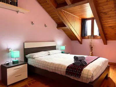Cama o camas de una habitación en El Raconet d'Espot - L'Amfitriona