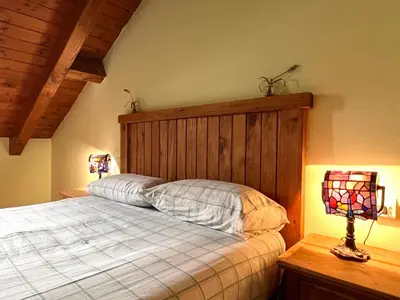 Cama o camas de una habitación en El Raconet d'Espot - L'Amfitriona
