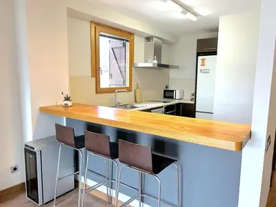 Una cocina o zona de cocina en Dúplex amb encant al casc antic d'Esterri i vistes úniques by RURAL D'ÀNEU