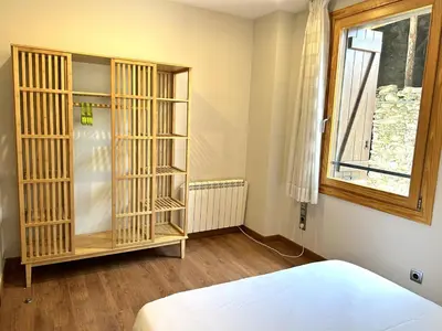 Cama o camas de una habitación en Apartament al centre d'Esterri amb vistes úniques by RURAL D'ÀNEU