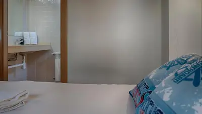 Cama o camas de una habitación en Saplan Real Estate LAUJÒ