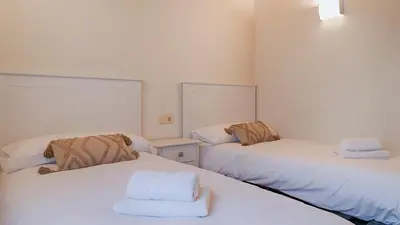 Cama o camas de una habitación en Saplan Real Estate LAUJÒ