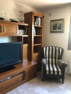 Una televisión o centro de entretenimiento en Casa Candelaria