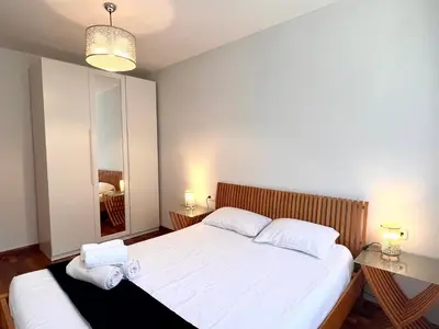 Cama o camas de una habitación en Apartament Els Raiers - L'Amfitriona