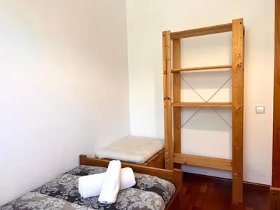 Cama o camas de una habitación en Apartament Els Raiers - L'Amfitriona