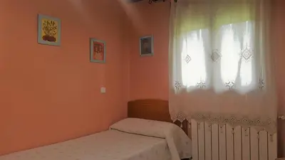 Cama o camas de una habitación en Casa Castel naturaleza y descanso