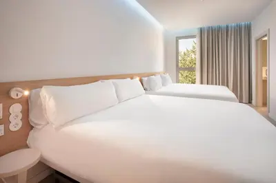 Cama o camas de una habitación en B&B HOTEL Lleida