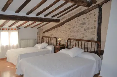 Cama o camas de una habitación en Cal Badat