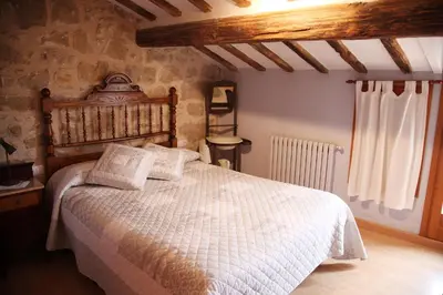 Cama o camas de una habitación en Cal Badat