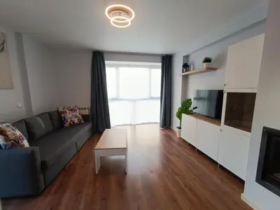 Una televisión o centro de entretenimiento en Margas Golf Apartment 2