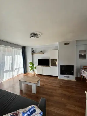 Una televisión o centro de entretenimiento en Margas Golf Apartment 2