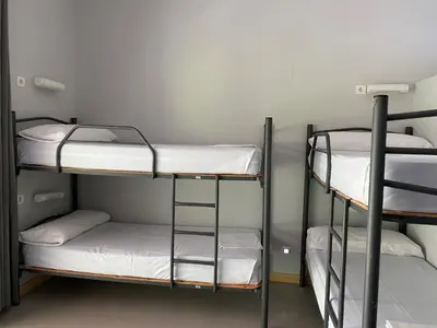 Cama o camas de una habitación en Albergue de Villava