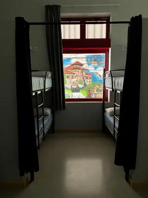 Cama o camas de una habitación en Albergue de Villava