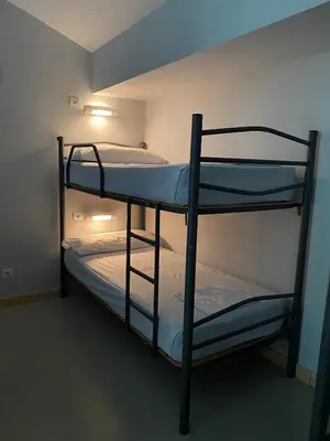 Cama o camas de una habitación en Albergue de Villava