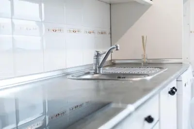 Una cocina o zona de cocina en Coqueto apartamento 2 dormitorios