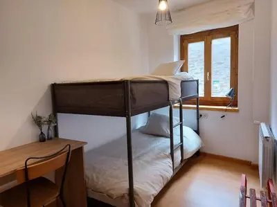 Cama o camas de una habitación en Acogedor dúplex en el Valle de Aran