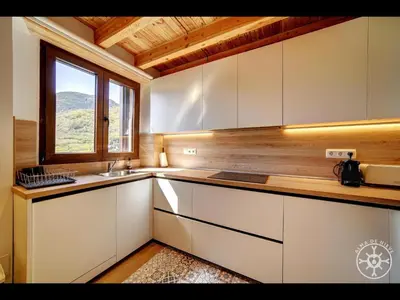 Una cocina o zona de cocina en CASA CORILHA de Alma de Nieve