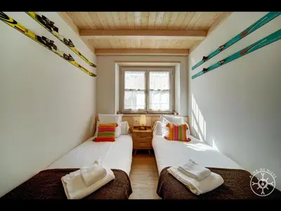 Cama o camas de una habitación en DOSSAU de Alma de Nieve