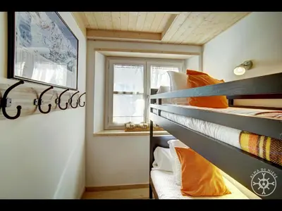 Cama o camas de una habitación en DOSSAU de Alma de Nieve