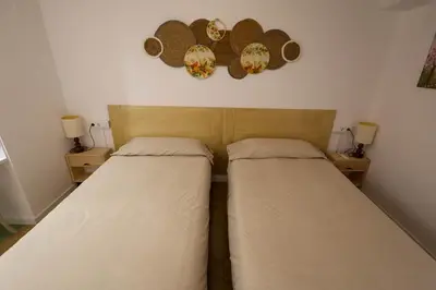 Cama o camas de una habitación en Ca l'Ametller
