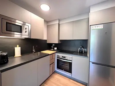 Una cocina o zona de cocina en Dúplex La Solana - L'Amfitriona