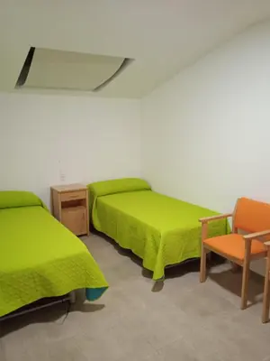 Cama o camas de una habitación en Albergue de Maella