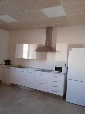 Una cocina o zona de cocina en Albergue de Maella