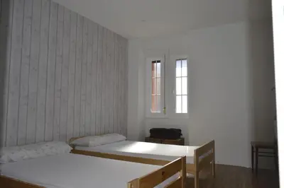 Cama o camas de una habitación en Albergue Gares