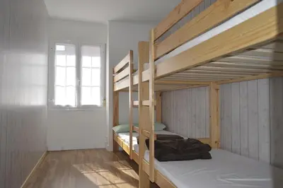 Cama o camas de una habitación en Albergue Gares