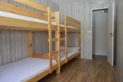 Cama o camas de una habitación en Albergue Gares